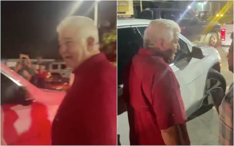 José Ramiro siendo increpado por manifestantes.