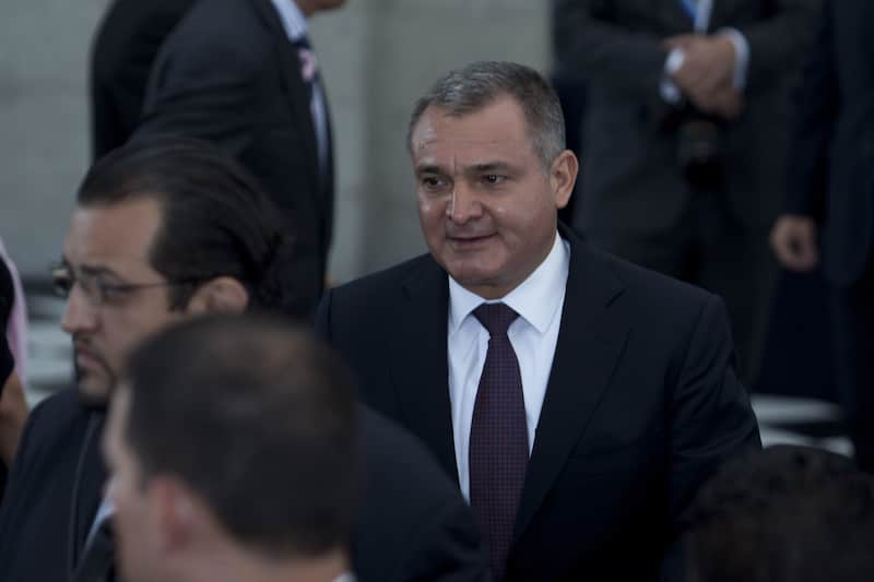 Genaro García Luna, secretario de Seguridad Pública con Felipe Calderón, presidente de México de 2006 a 2012. Genaro García Luna, secretario de Seguridad Pública durante el evento del Día Internacional de la Lucha Contra el Tráfico Indebido y el Tráfico Ilícito de Drogas que se realizó en el Alcazar del Castillo de Chapultepec el 26 de junio de 2012.